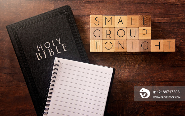 Small Group Tonight in Block Letters on a Wooden Table with a Holy Bible