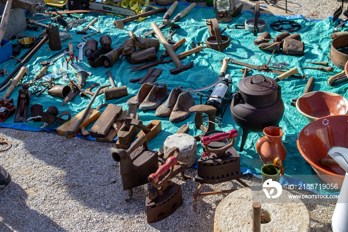 The monthly flea market in Quarteira, Portugal, where a wide selection of second hand goods are on sale.In this section second hand goods are spread on the ground.