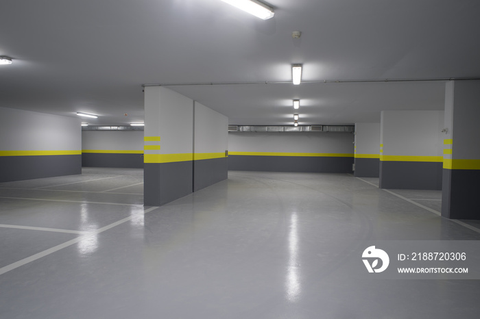 Empty parking garage underground interior in apartment or in supermarket..