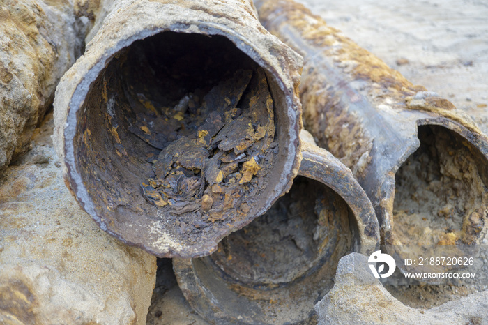 pipes clogged with sediment rust