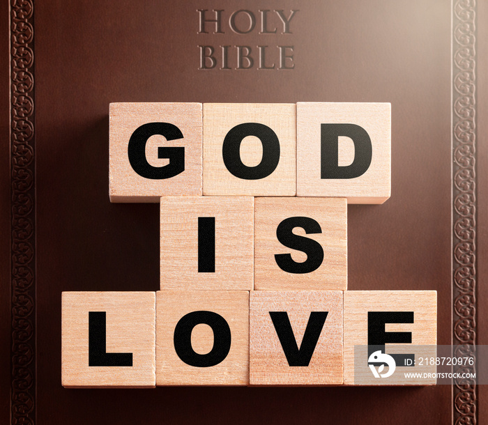 God is Love Spelled in Blocks on a Brown Leather Holy Bible