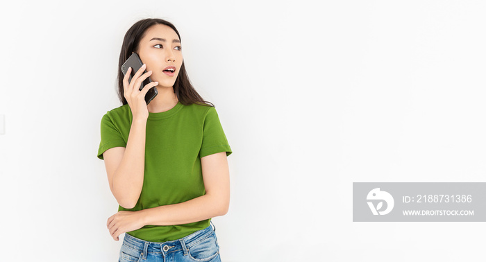 Portrait of beautiful Asian japanese successful business girl talking with smartphone with copy space on white background. Success and happy woman education internet technology startup business