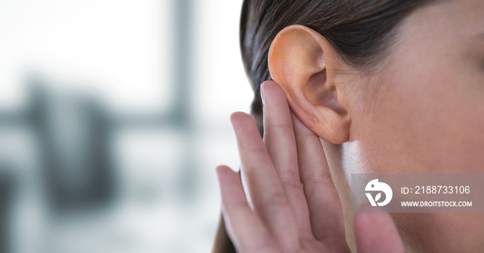 Cropped image of woman hearing gossip