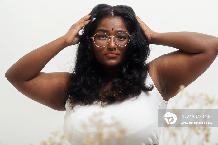 South Asian female solo lifestyle studio portrait shot