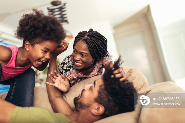 African american family spending time together at home. They are having fun