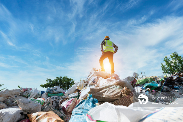 ecological engineering standing on the mountain rubbish big pile of garbage degraded waste A pile of bad smells and toxic residues. These wastes come from urban areas. industrial area