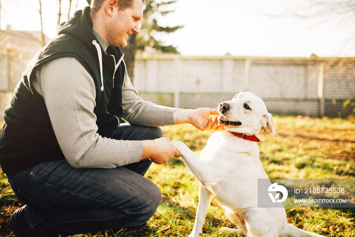 Male cynologist with trained working dog