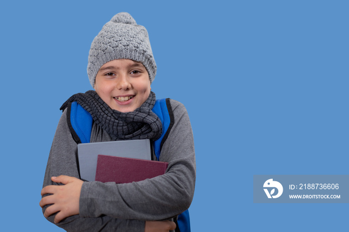 student kid going to school in winter