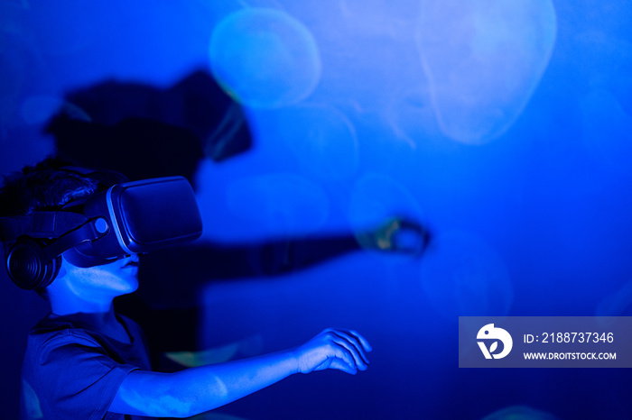 kid experiencing using a virtual reality headset