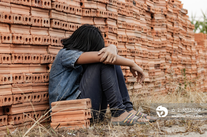 Child working in a brick factory. world day against child labor concept