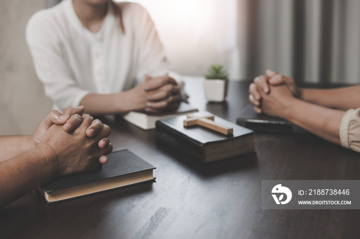 Religious concepts, The hands of a group of teenagers holding a cross. Eucharist Therapy Bless God Helping Repent Catholic Easter Lent Mind Pray. Christian concept background.