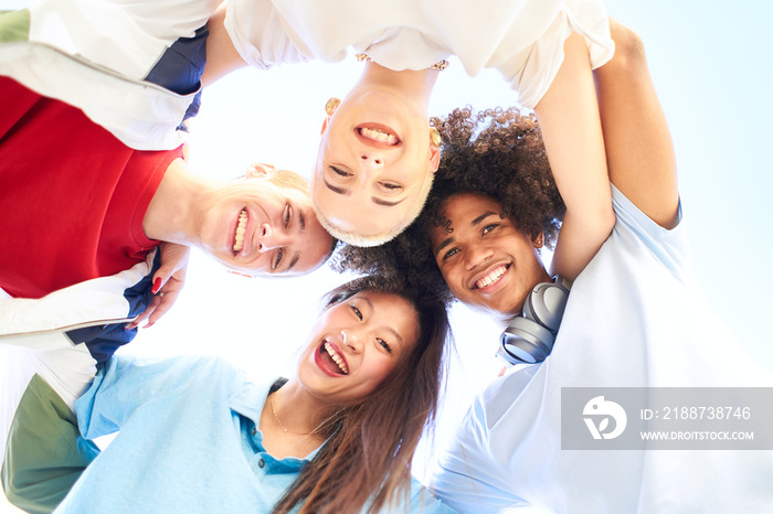 Happy multiracial friends having fun together. Group of smiling people looking at camera. Teenagers young students community and friendship lifestyle concept