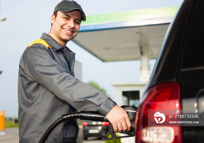 Gas station attendant at work