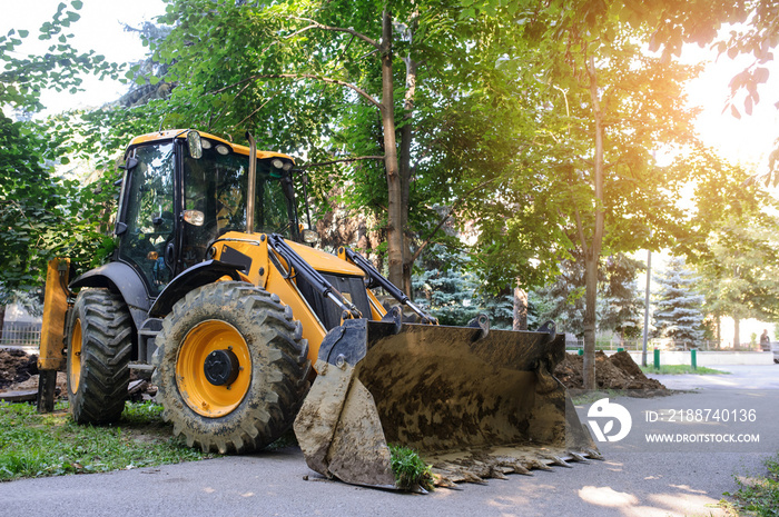 working excavator tractor digging a trench for pipenline