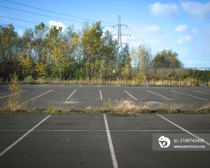 Abandoned car park of steelworks, now closed, UK