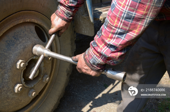 Mechanic working on a broken down vehicle