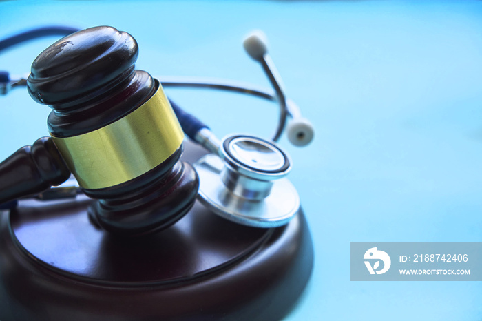 Gavel and stethoscope. medical jurisprudence. legal definition of medical malpractice. attorney. common errors doctors, nurses and hospitals make.