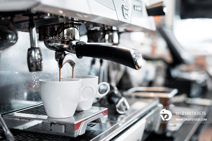 two black coffee morning on coffee maker