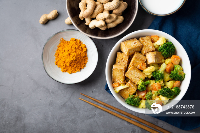 Stir fried tofu with vegetables and peanut sauce