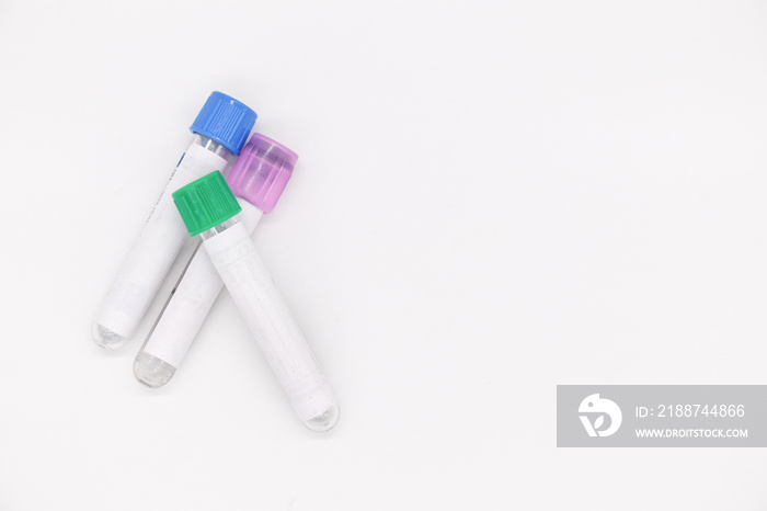 Three vacuum tubes for collection blood samples on white background