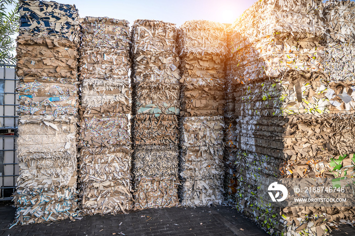 Bales of cardboard and box board with strapping wire ties