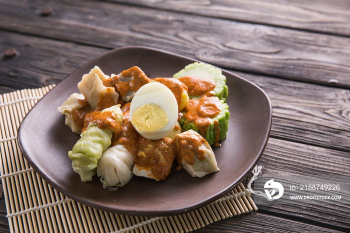 siomay. traditional indonesian food with peanut sauce