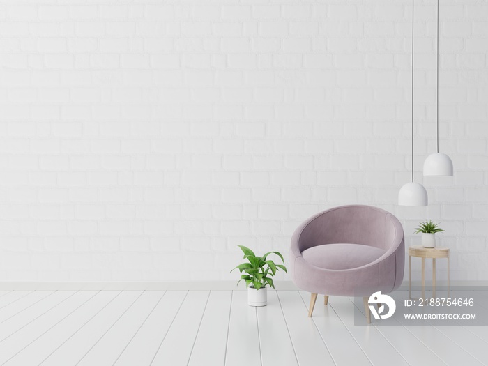 Living room with pink fabric armchair, book and plants on empty white wall background.