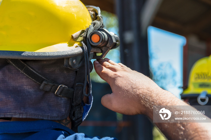 photo of firefighter waving from behind