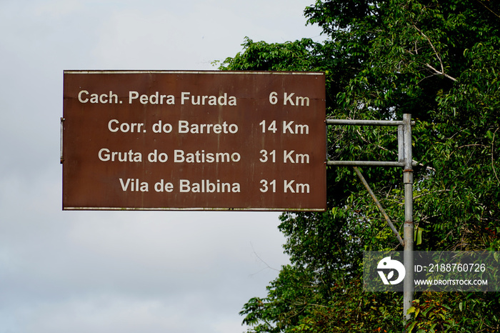 Signposts to various waterfalls in Amazon rainforest. The most beautiful falls in Amazon rainforest are located near highway AM 240 between the communities of Presidente Figueiredo and Balbina, Brazil