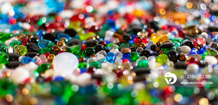 Colorful background made of different kinds of beads