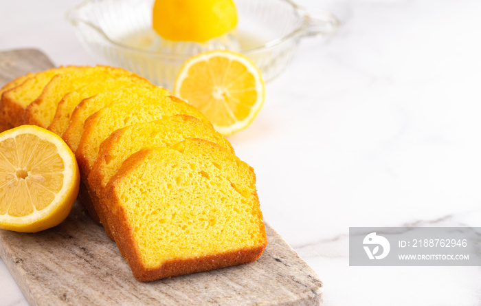 A Sliced Lemon Cake on a Kitchen Counter