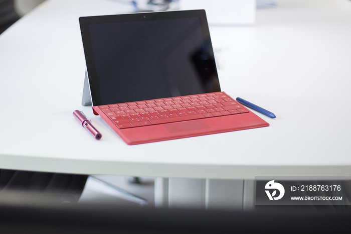 Surface pro tablet place on white table in meeting room