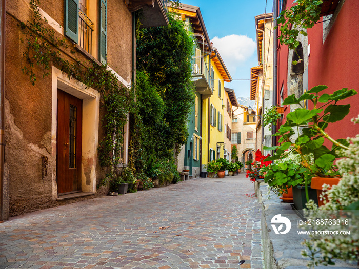 Wonderful glimpse of a colorful alley in the town of Mandello sul Lario, on Lake Como