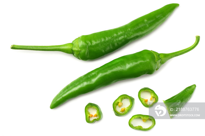 green hot chili peppers with slices isolated on white background top view