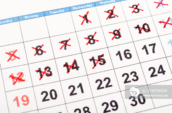 Red cross mark on the calendar