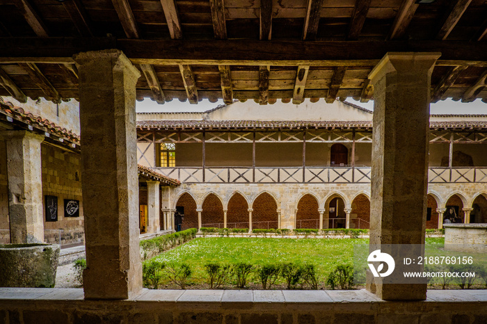 View on the arcades of the medieval cloister of the romanesque abby of Flaran in the south of France (Gers)