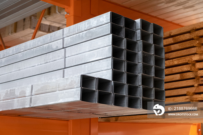 Stack of Building Material Aluminum Profile For Drywall At The Construction Work Site. For construction support  frame for plasterboard, gypsum board, plasterboard fastening