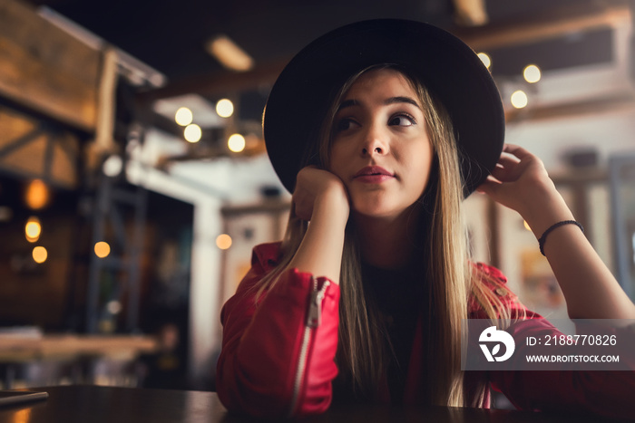 Portrait of beautiful urban girl out in the café club. Modern youth culture. Young woman with attitude. Beautiful urban influencer vlogger woman.