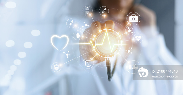 Medicine doctor with  stethoscope in hand touching icon medical network connection with modern virtual screen interface, medical technology network concept