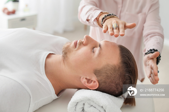 Reiki master working with patient