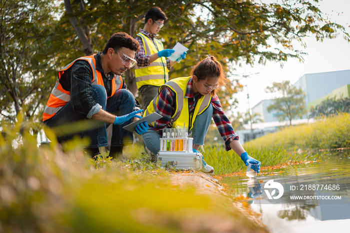 Scientists team collect water samples for analysis and research on water quality, environment with saving earth.