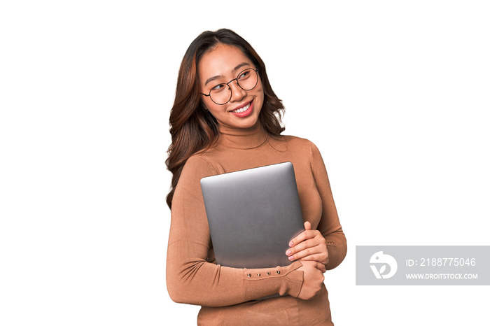 A young asian woman working with her laptop