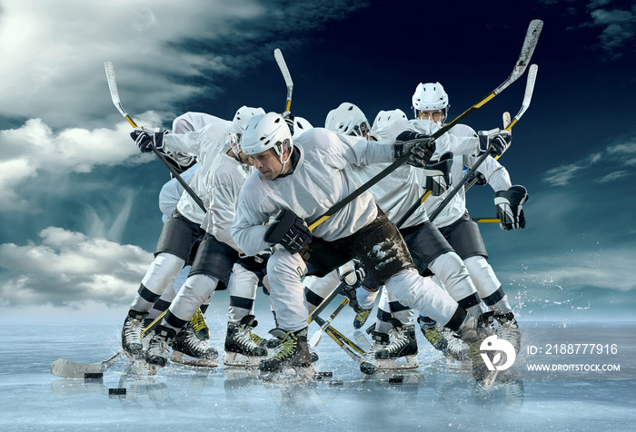 Ice hockey player in action outdoor around mountains