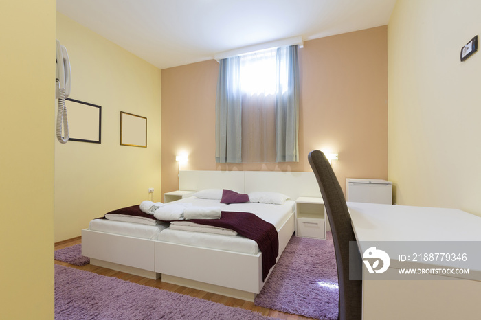 Interior of a hotel bedroom in the basement