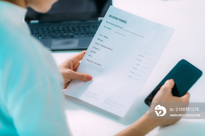 Woman Checking her Bloodwork Results