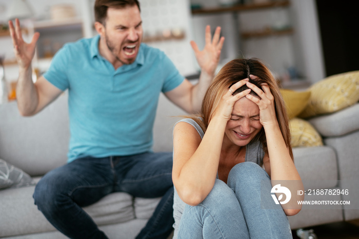 Violence in family. Husband beating his wife..