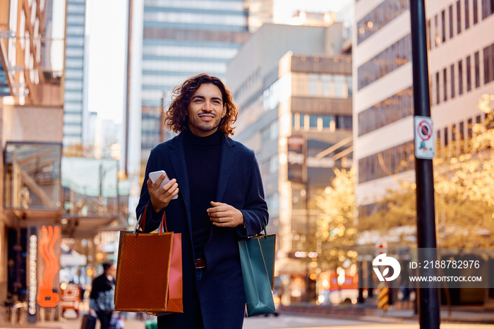 Smiling Hispanic man enjoys in shopping day in city.