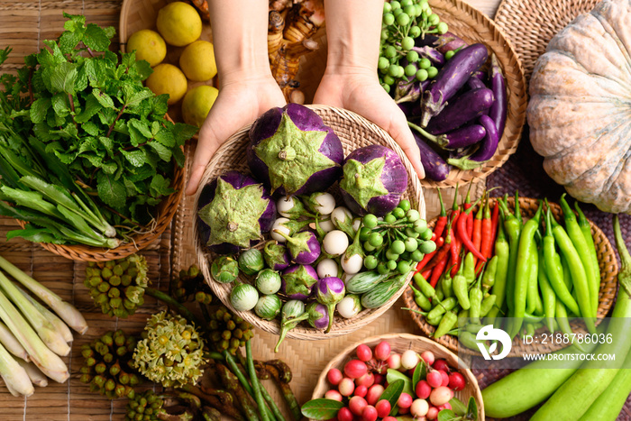 Organic Southeast Asian vegetables and spices from local farmer market in Thailand, Sustainability concept, Table top view