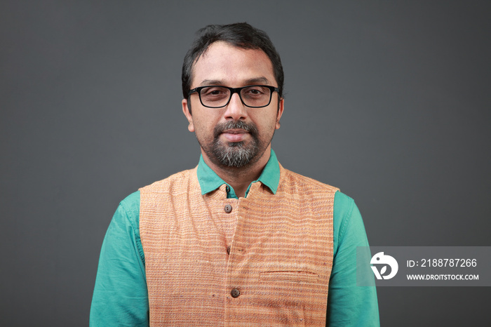 Portrait of a smiling man of Indian ethnicity