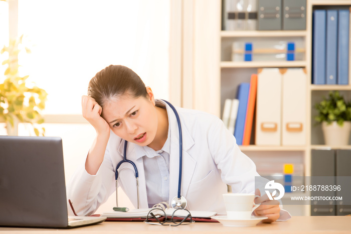 Overworked woman doctor feel headache